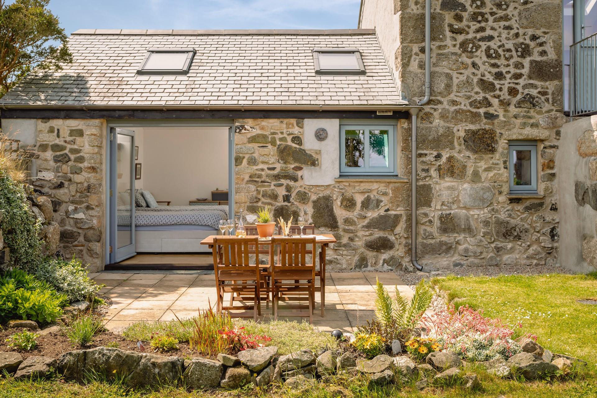 Enjoy a sundowner in the beautiful garden.