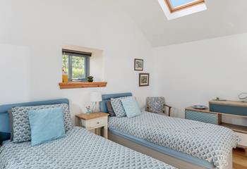 Tuck into the twin beds after a busy day of exploring.
