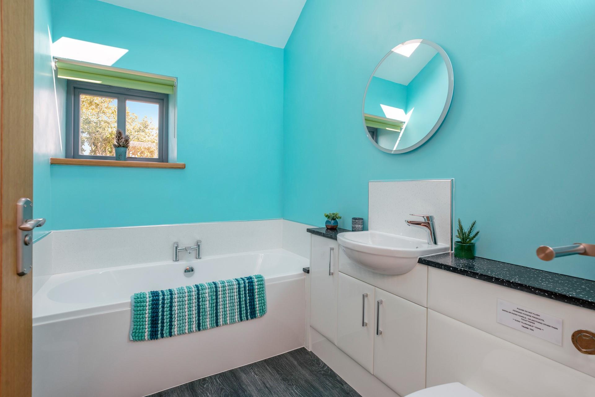 Sink into a bubble bath after a coastal walk.