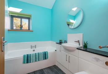 Sink into a bubble bath after a coastal walk.