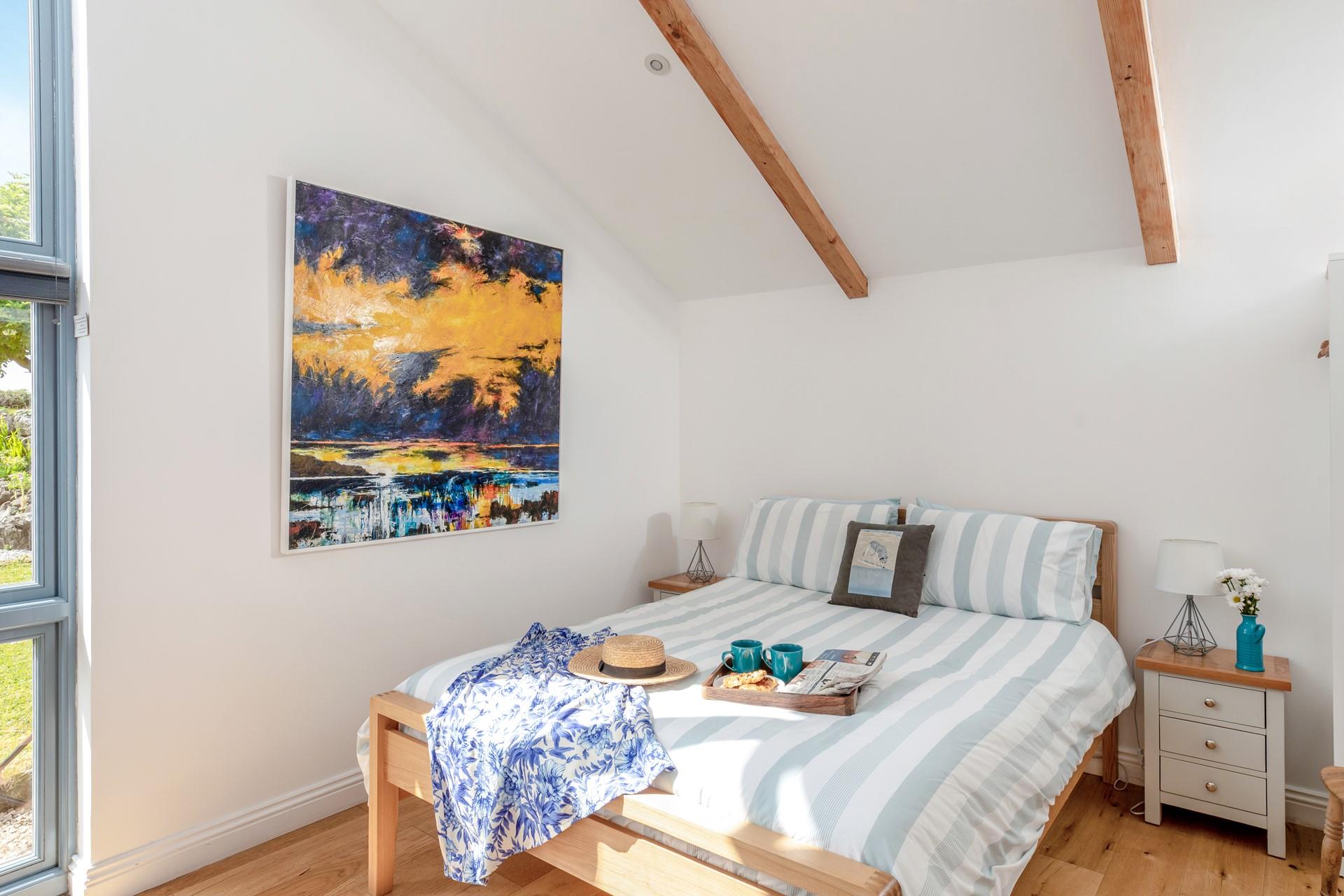 The king size bed promises a blissful night's sleep, leaving you rested and ready for the day ahead.