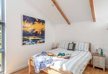 The king size bed promises a blissful night's sleep, leaving you rested and ready for the day ahead.