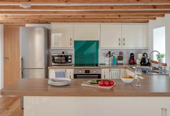Rustle up a tasty feast in the fully equipped kitchen.