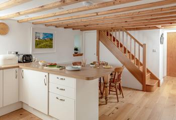 Tuck into a feast at the dining table.