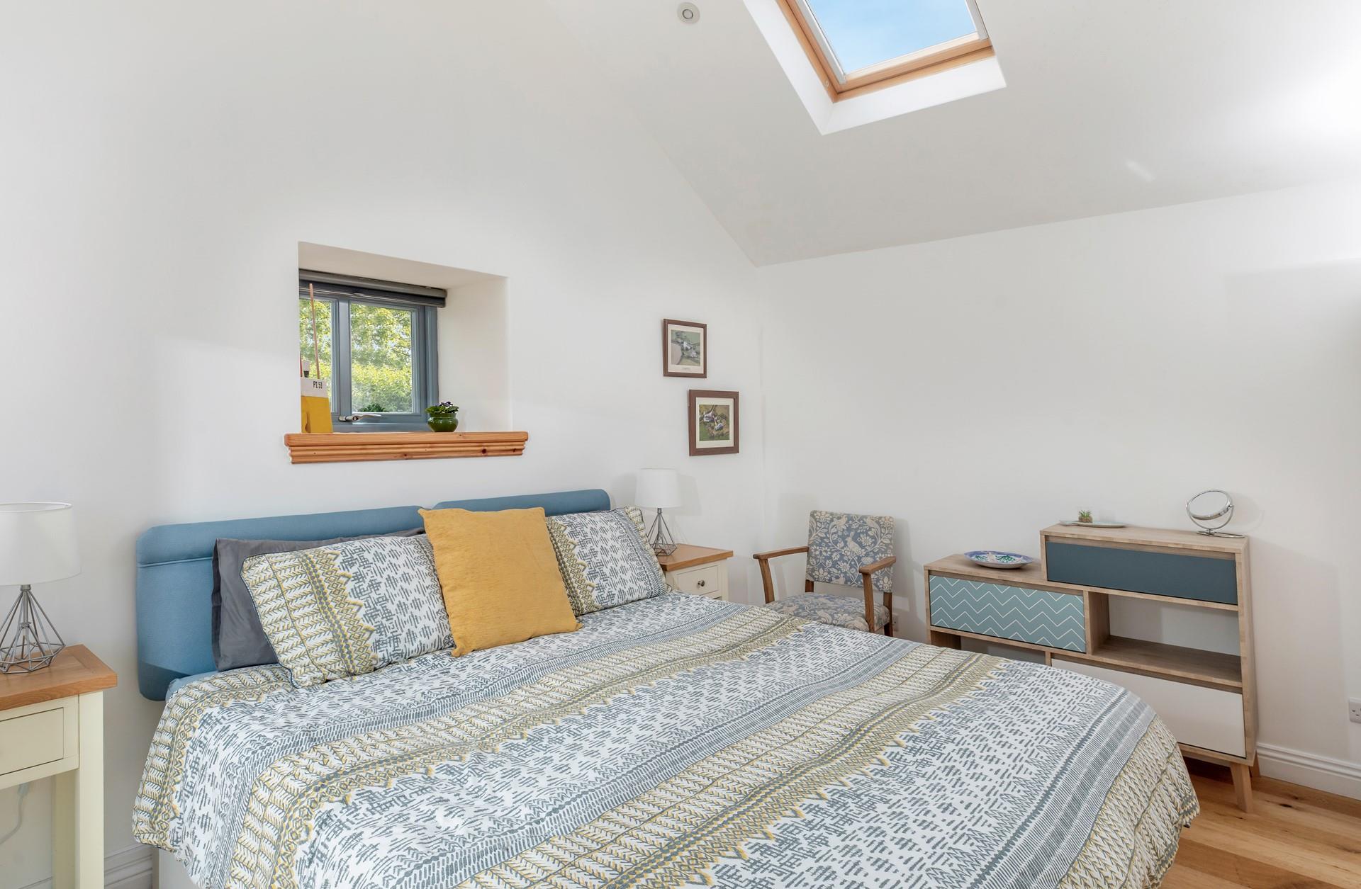 The bedrooms are simply decorated with seaside tones.