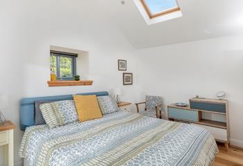 The bedrooms are simply decorated with seaside tones.