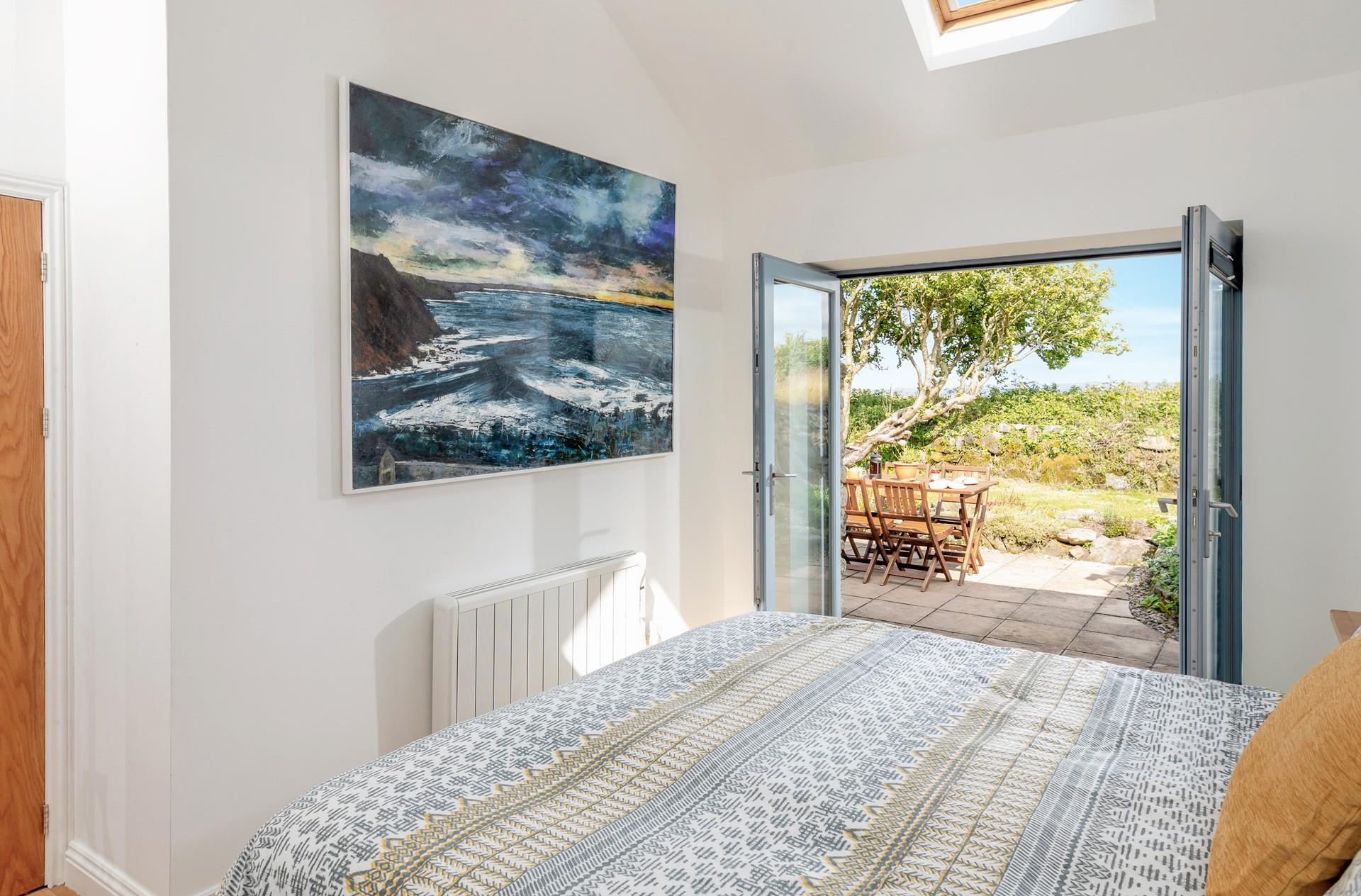 Open the patio doors and wander out to the garden.