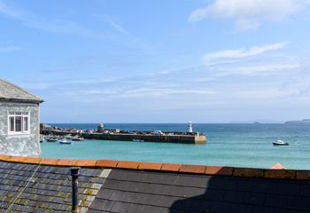 Robin's Nest offers views over the rooftops, and beyond to Godrevy Lighthouse. 