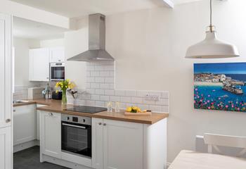 The modern kitchen is sleek and stylish, perfect for cooking up some fine cuisine using local produce. 