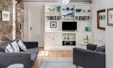 The open plan living space is a cosy base to spend time with a loved one. - Thumbnail Image