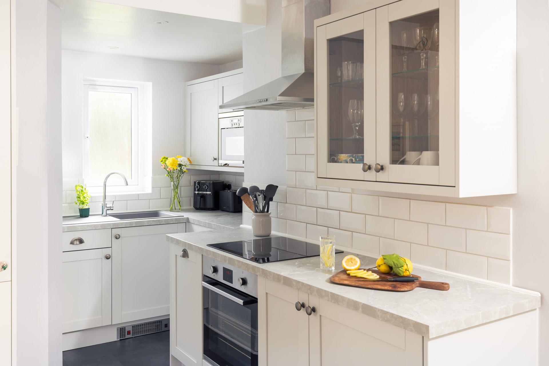 The modern kitchen is sleek and stylish, perfect for cooking up some fine cuisine using local produce. 
