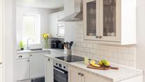 The modern kitchen is sleek and stylish, perfect for cooking up some fine cuisine using local produce. 