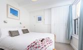Bedroom 1 is bright and airy, boasting a comfortable double bed and plenty of storage for your holiday best! - Thumbnail Image
