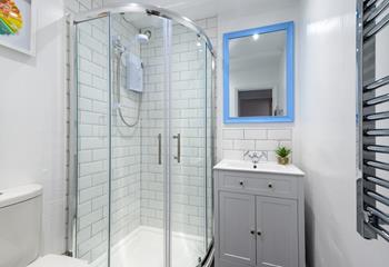 The bathroom has been tastefully designed with modern fixtures and fittings.