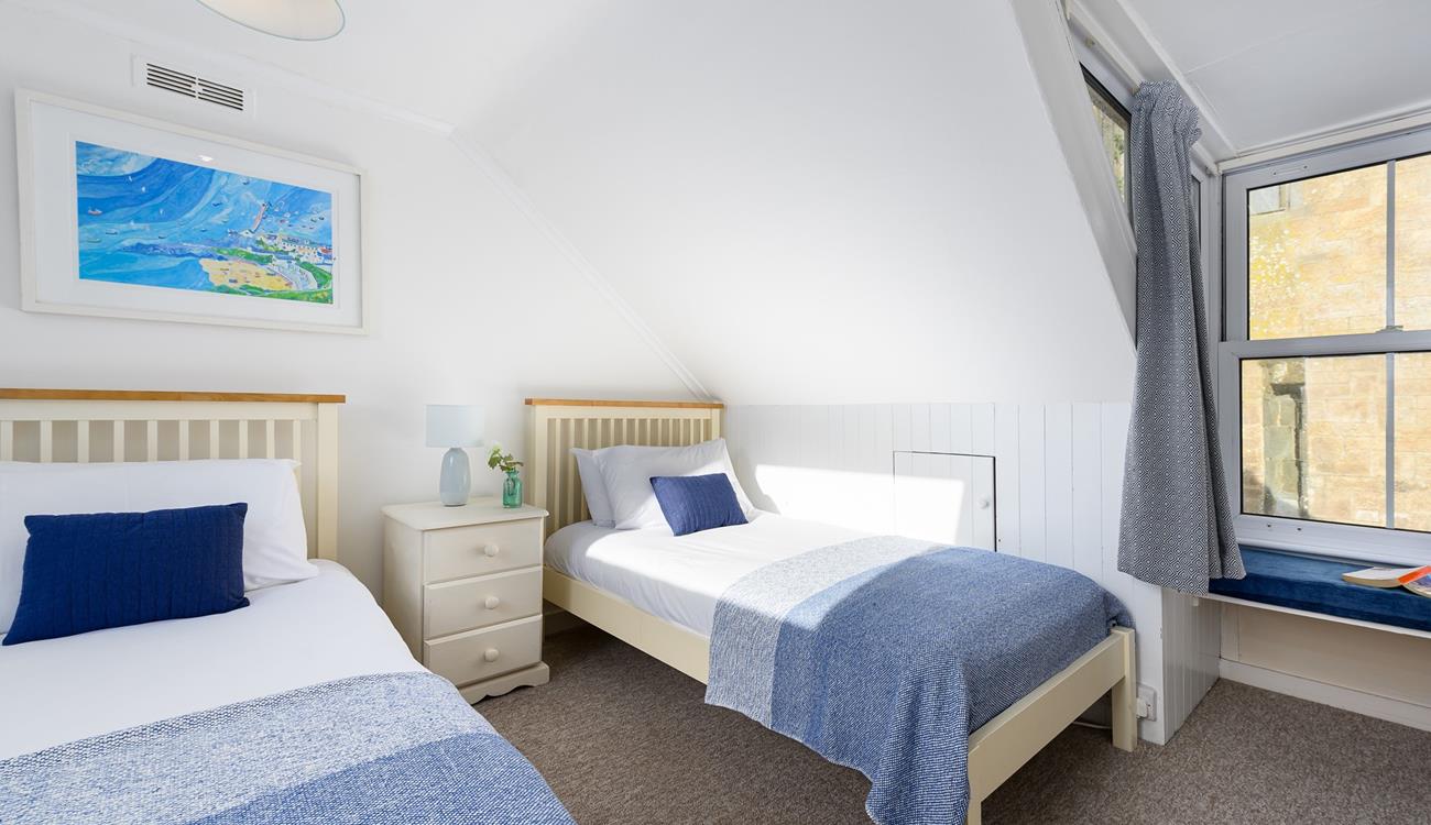 Coastal colours and artwork remind you just how close you are to the sea.