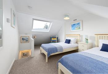 Bedroom 2 has twin beds that are perfect for children or friends sharing.