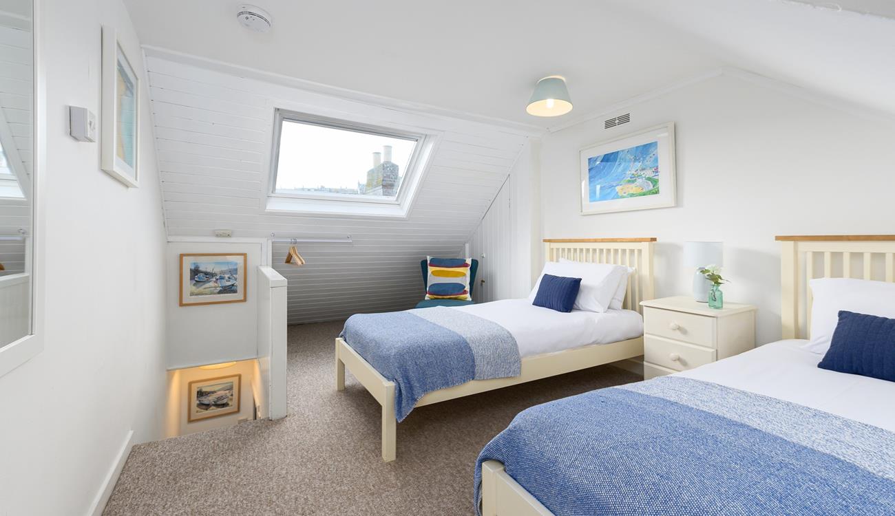 Bedroom 2 has twin beds that are perfect for children or friends sharing.