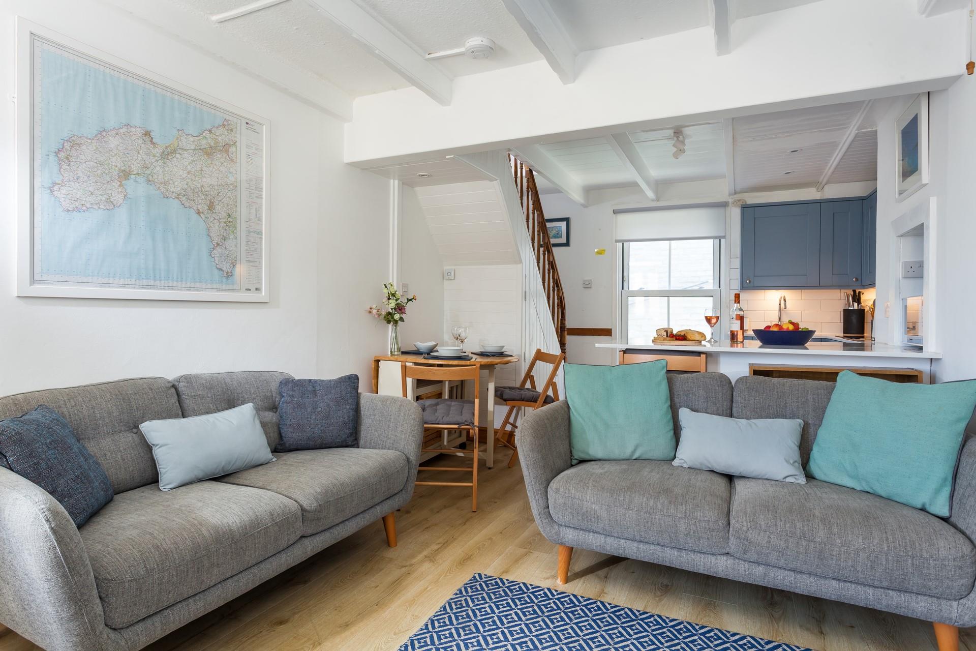 Traditional features such as exposed beams add to the property's character.