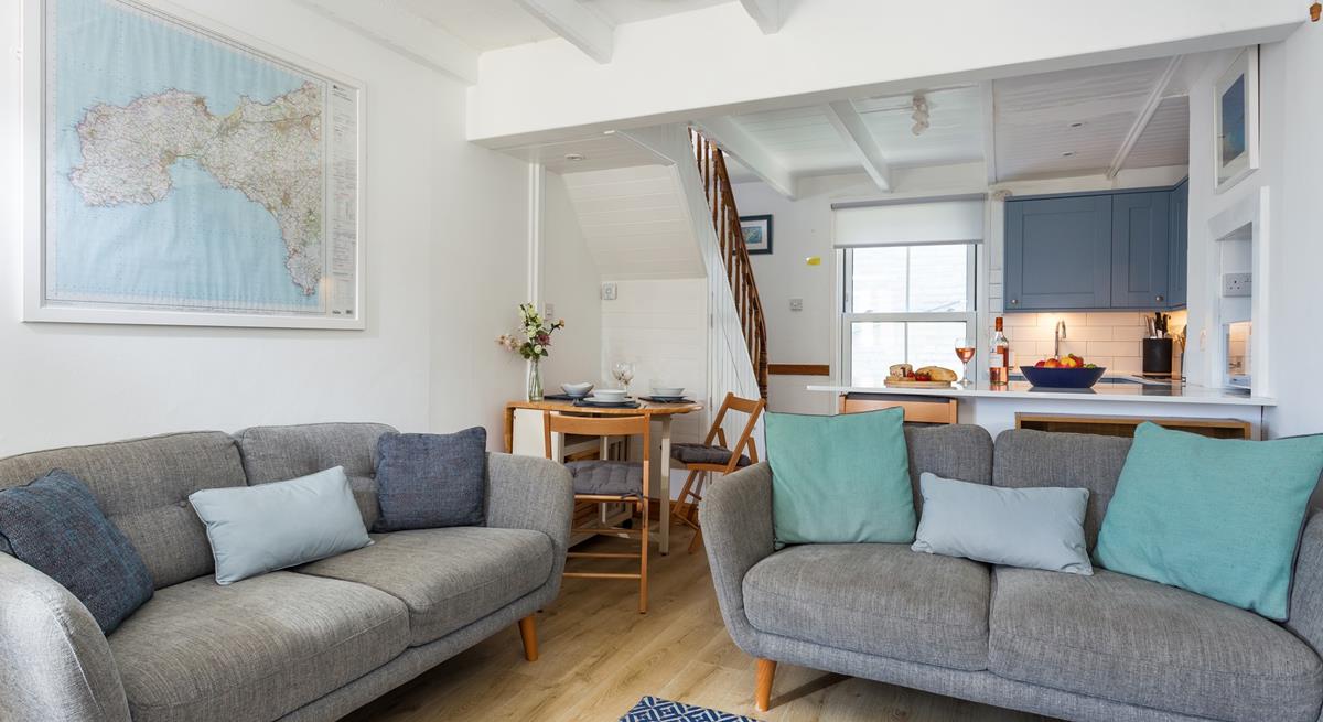 Traditional features such as exposed beams add to the property's character.