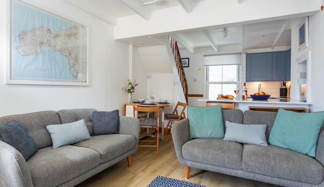 Traditional features such as exposed beams add to the property's character.