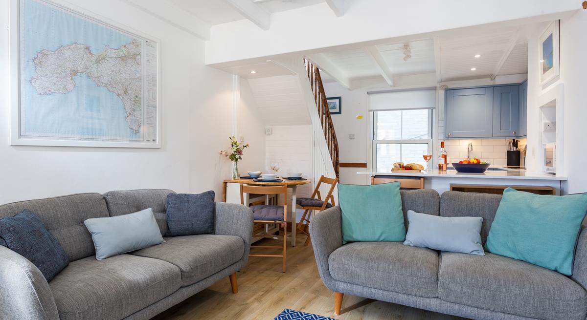 Soft tones and cosy furnishings have created a welcoming space to relax with your loved ones.