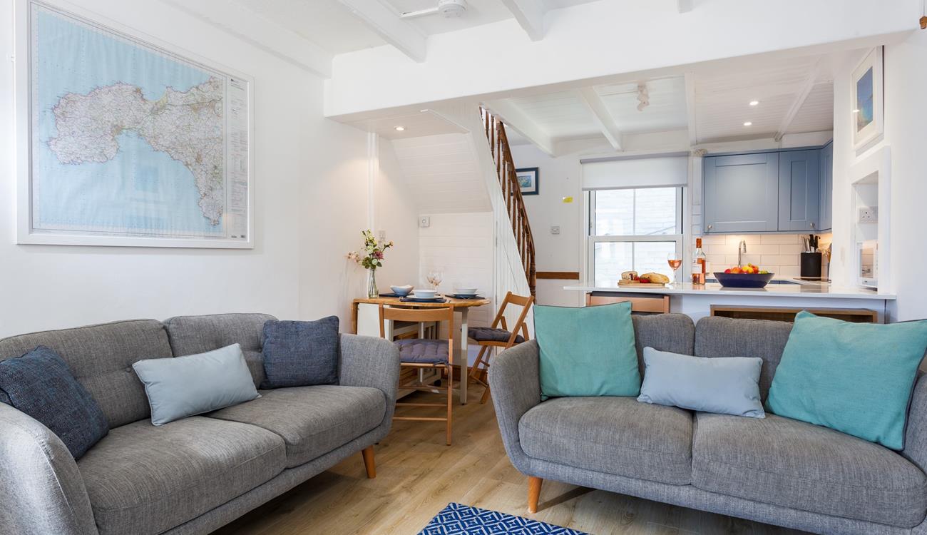 Soft tones and cosy furnishings have created a welcoming space to relax with your loved ones.