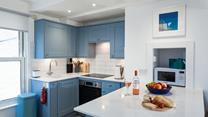Though compact, the kitchen has been thoughtfully designed to make cooking up delicious meals a breeze.