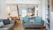 We love the blue tones that reflect the property's proximity to the coast.