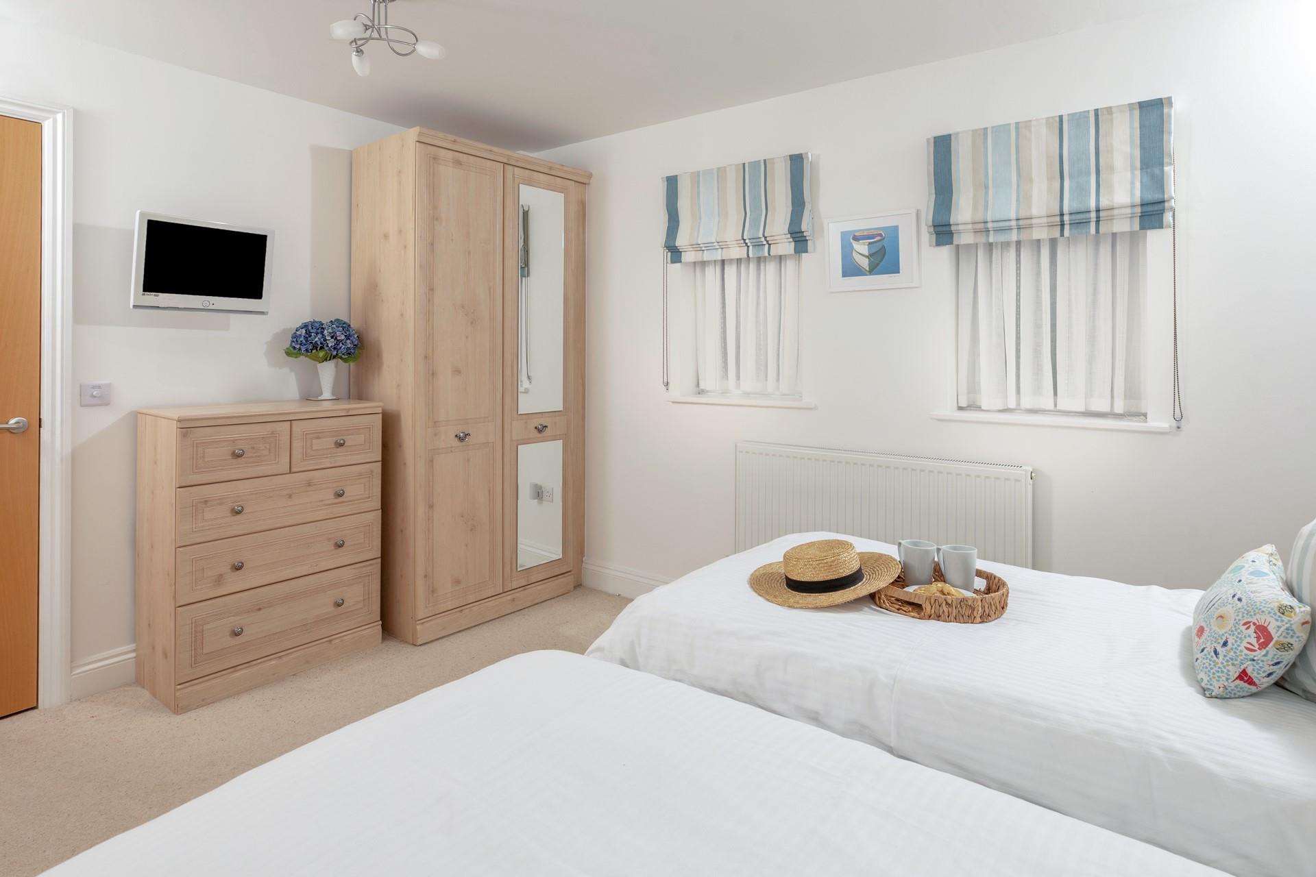 There's plenty of storage in the twin bedroom too!