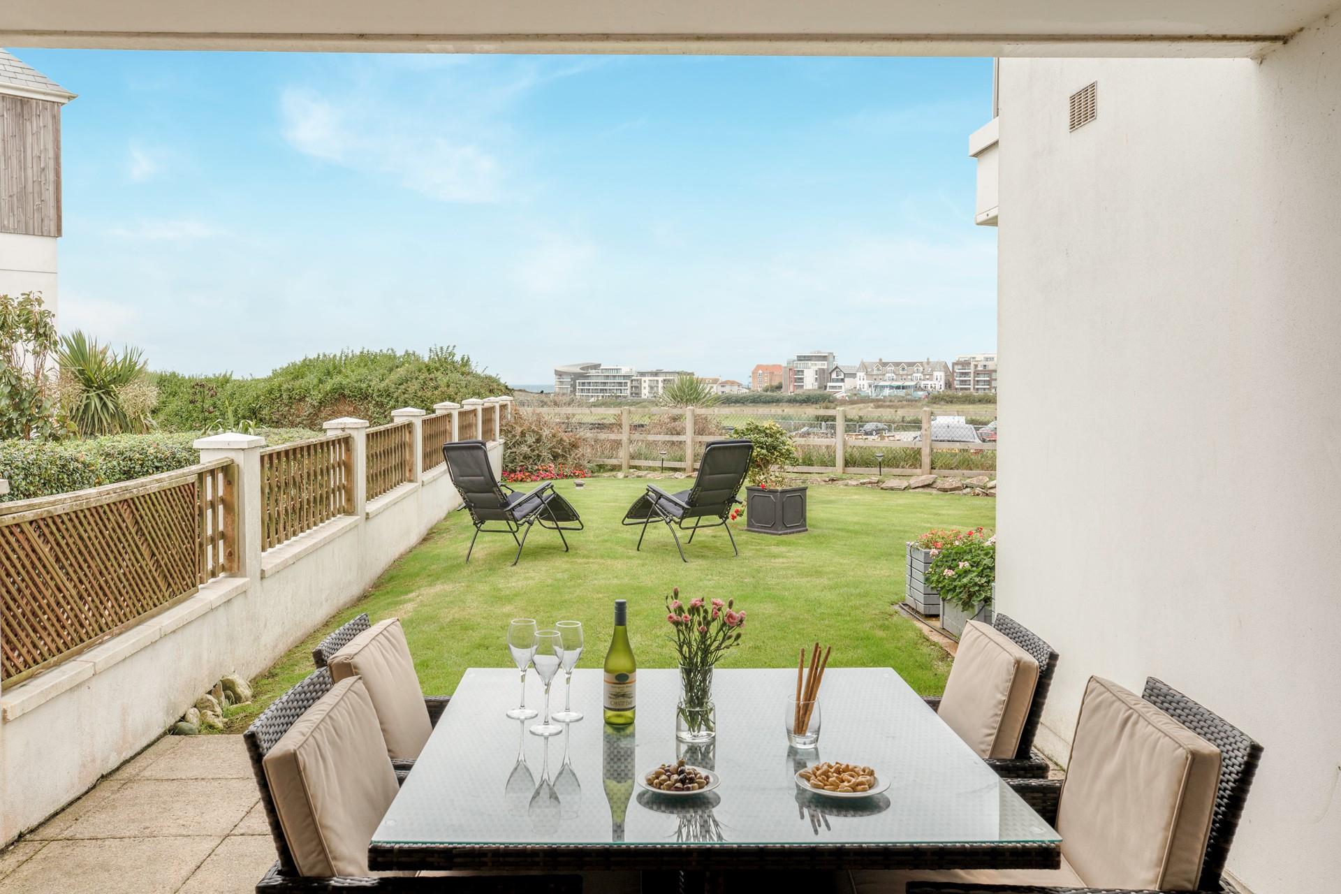 Views across golf course offer a glimpse of the ocean on the horizion.