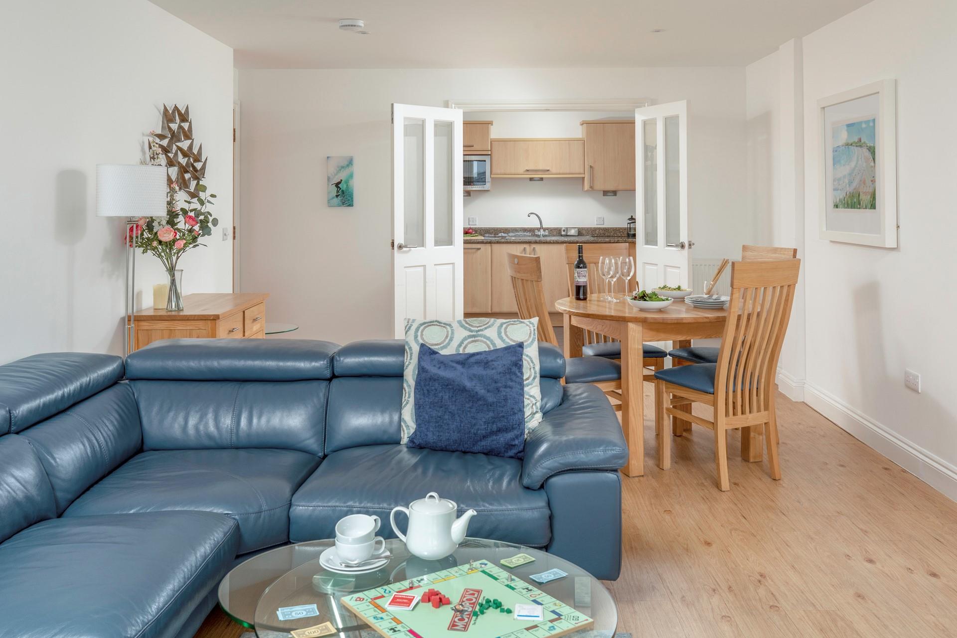 The open plan living and dining area has plenty of space for family fun!