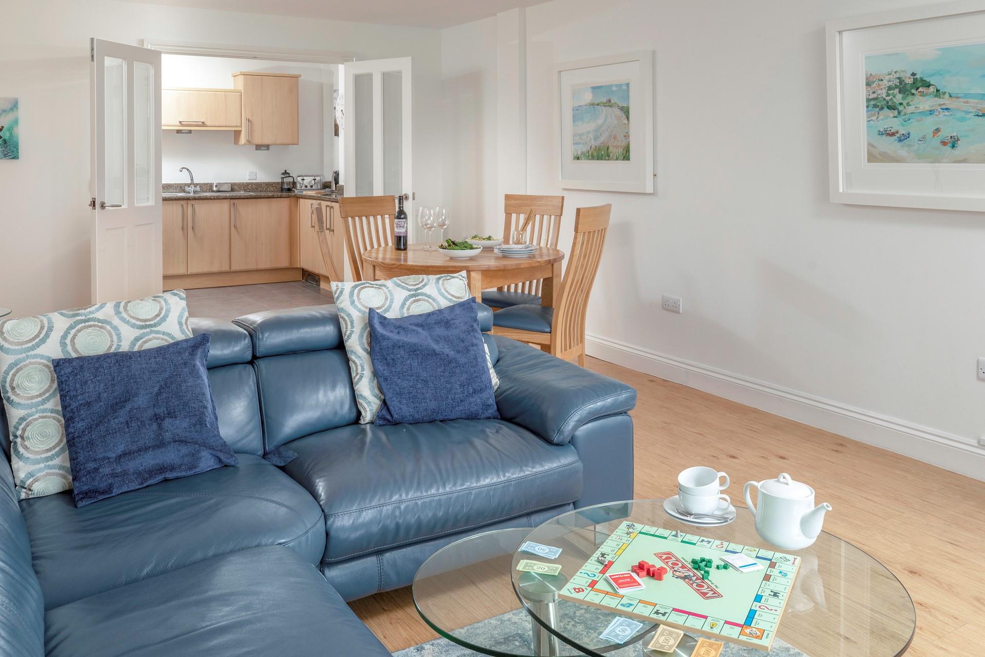 Decorated in coastal creams and blues, the living space is a relaxing haven for all the family.