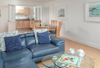 Decorated in coastal creams and blues, the living space is a relaxing haven for all the family.