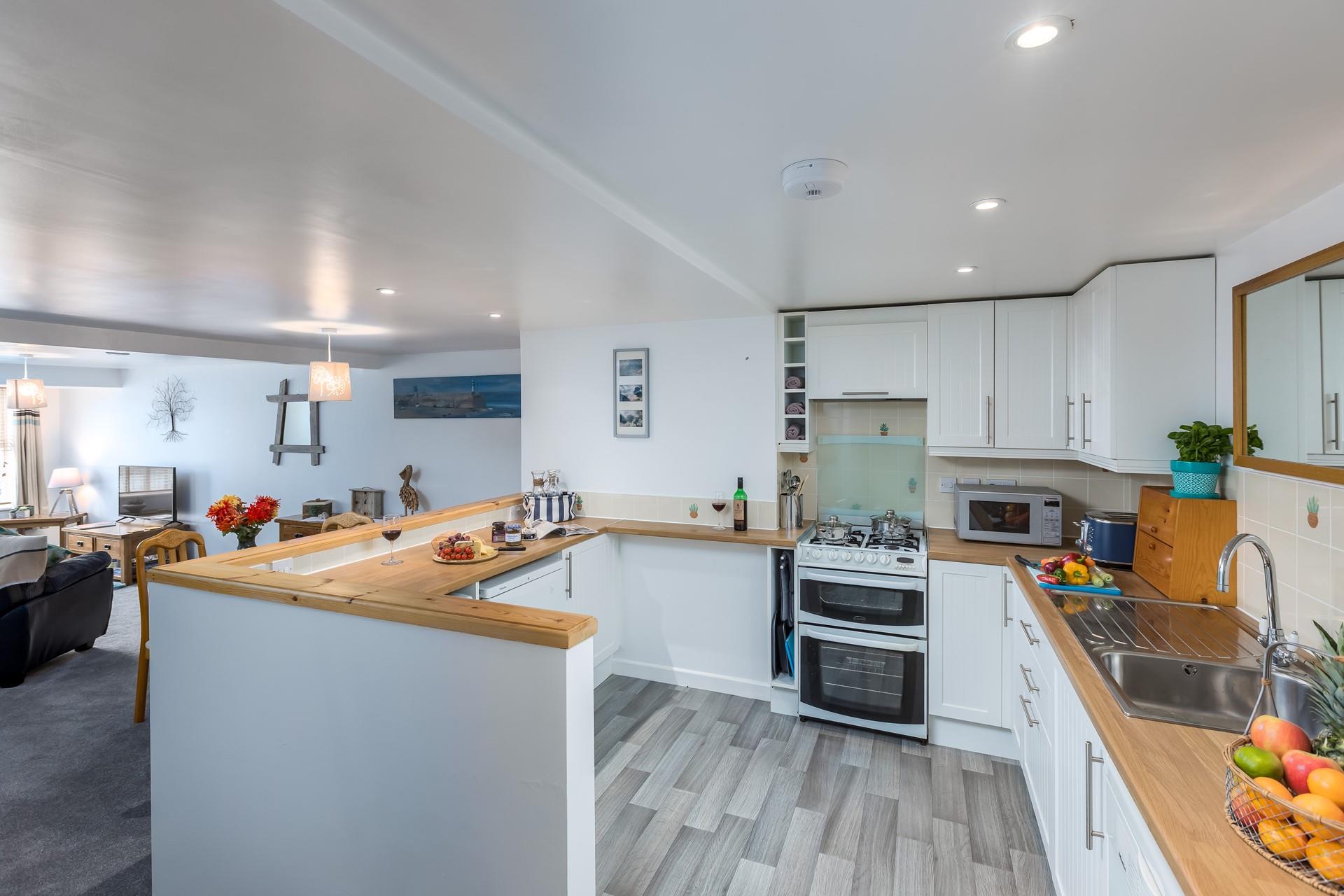 The kitchen is fully equipped for cooking hearty meals and cooked breakfasts.