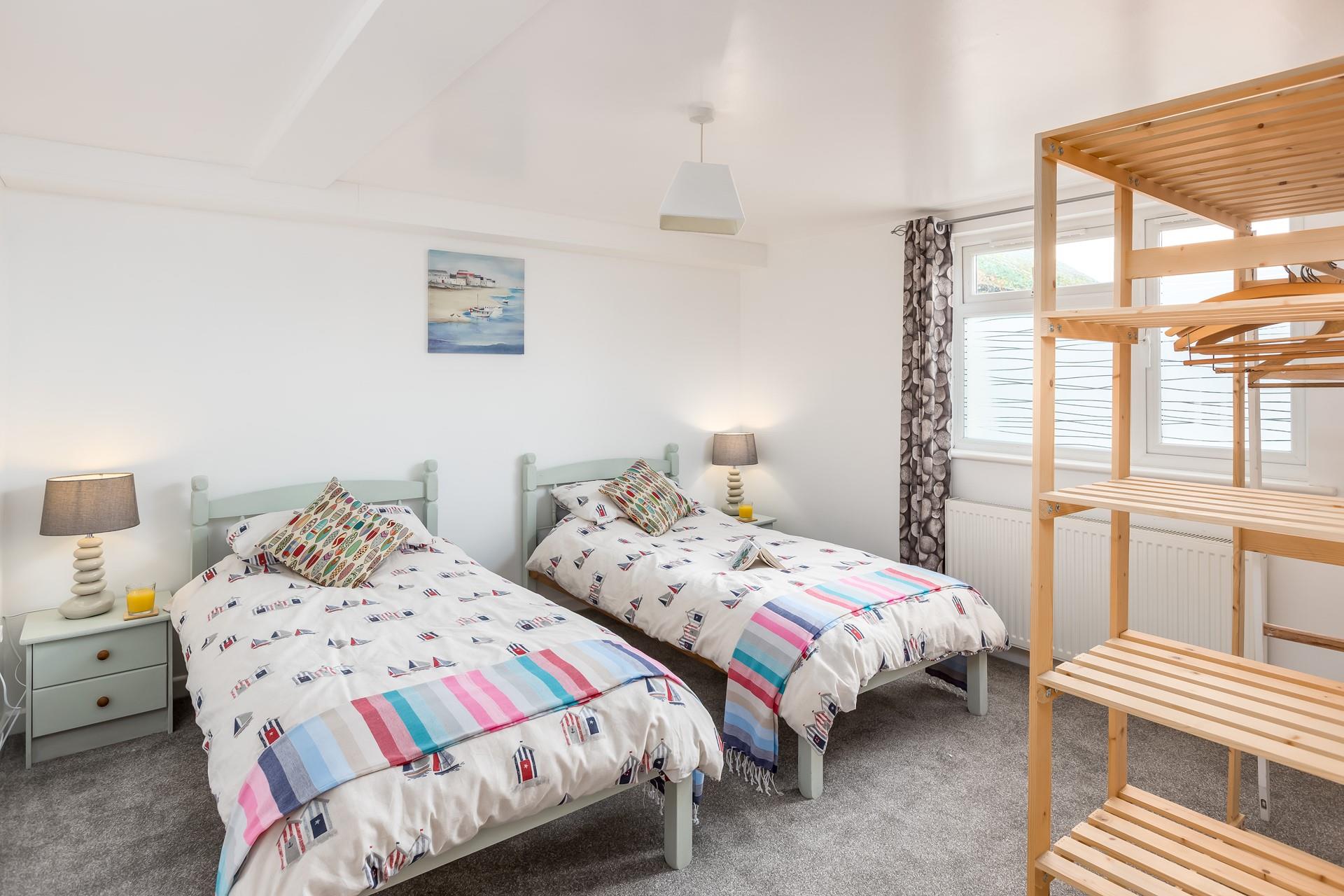 Bedroom 2 has twin beds perfect for the little ones.