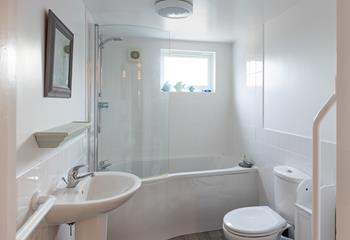 The family bathroom is a great space to get ready for the day or for sinking into a relaxing bath in the evening.