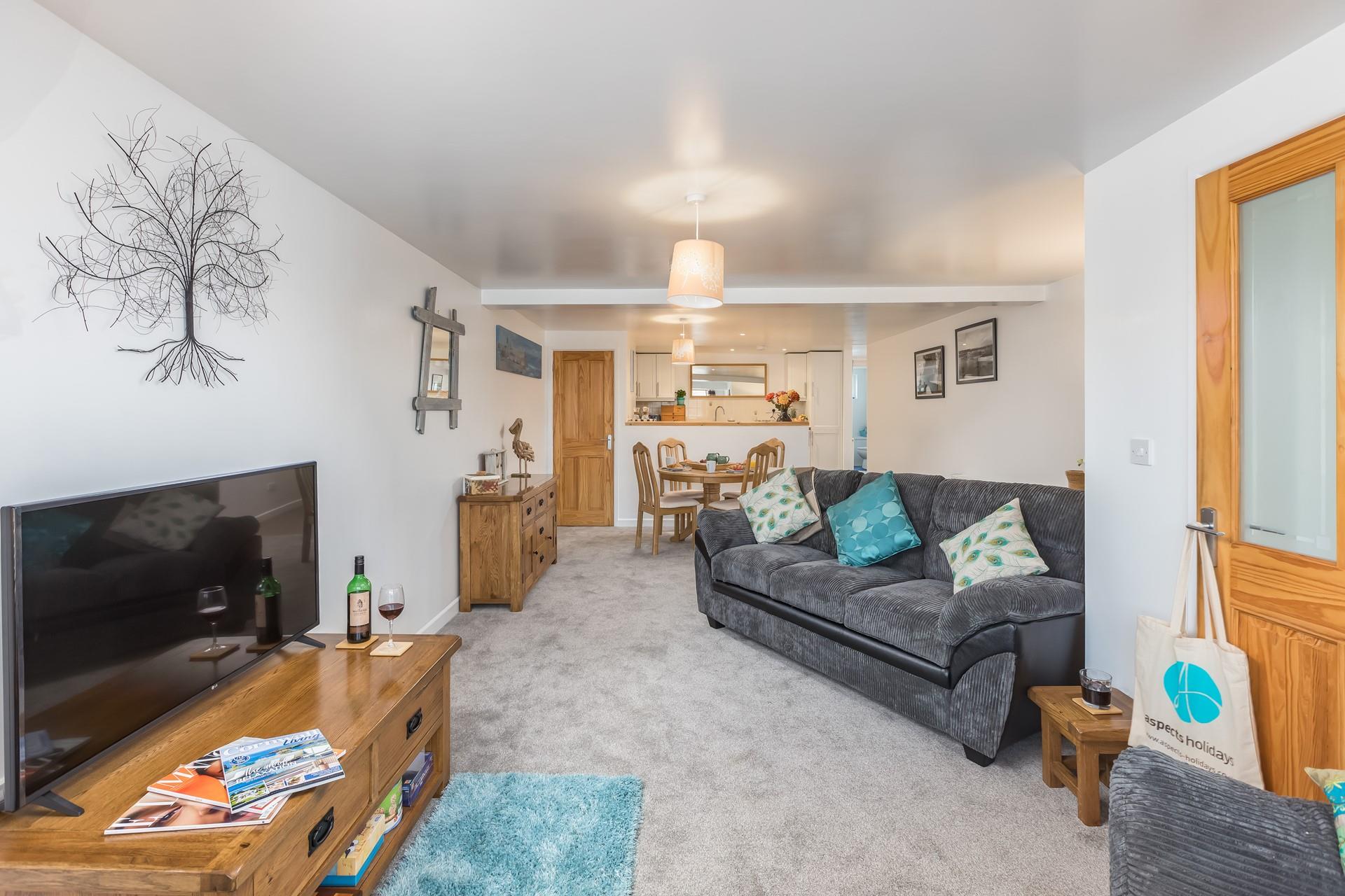 Sink into the comfortable sofa and gather the family around for a movie night.