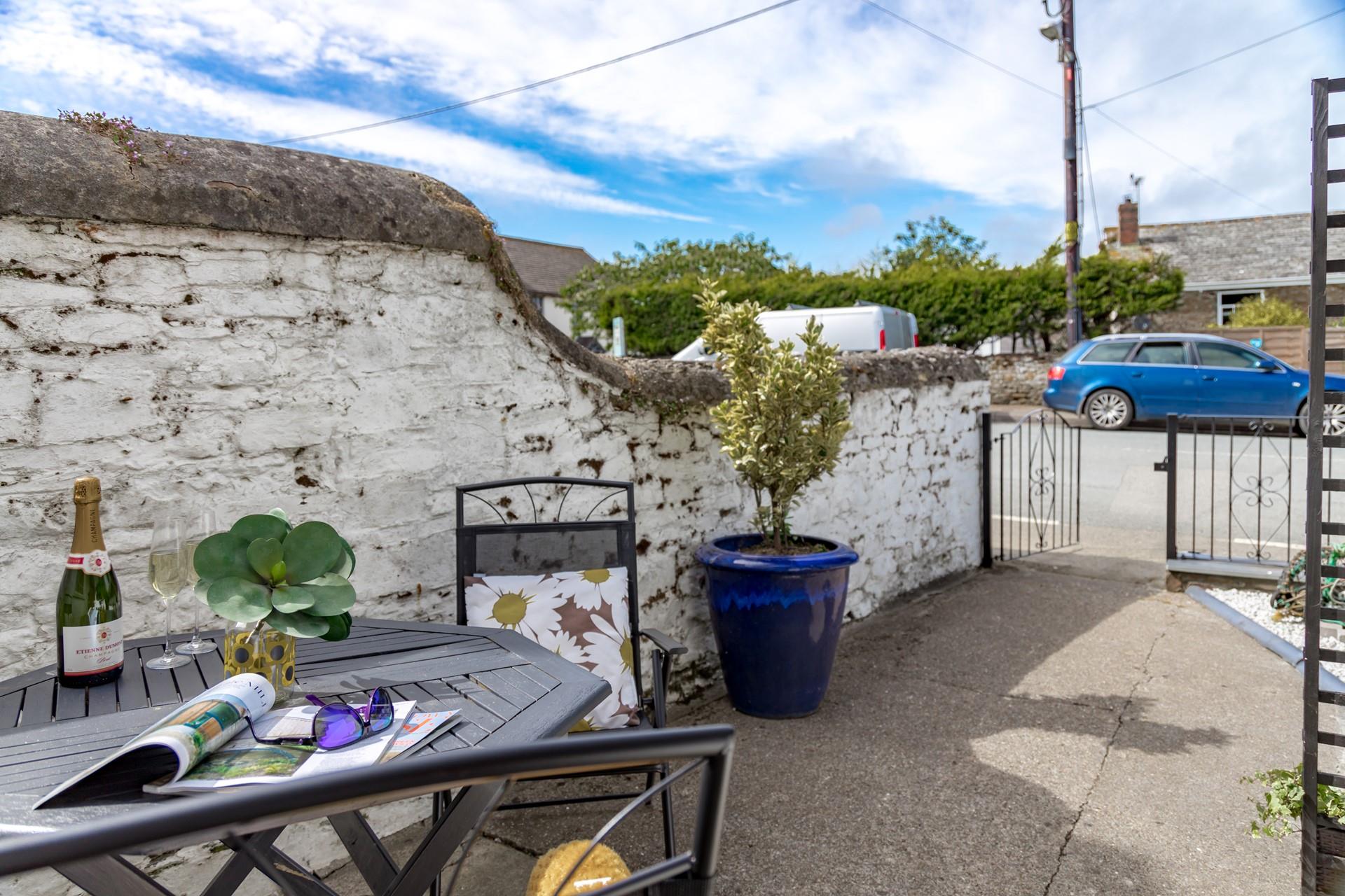 On-street parking is available just outside, across from the quaint courtyard. 