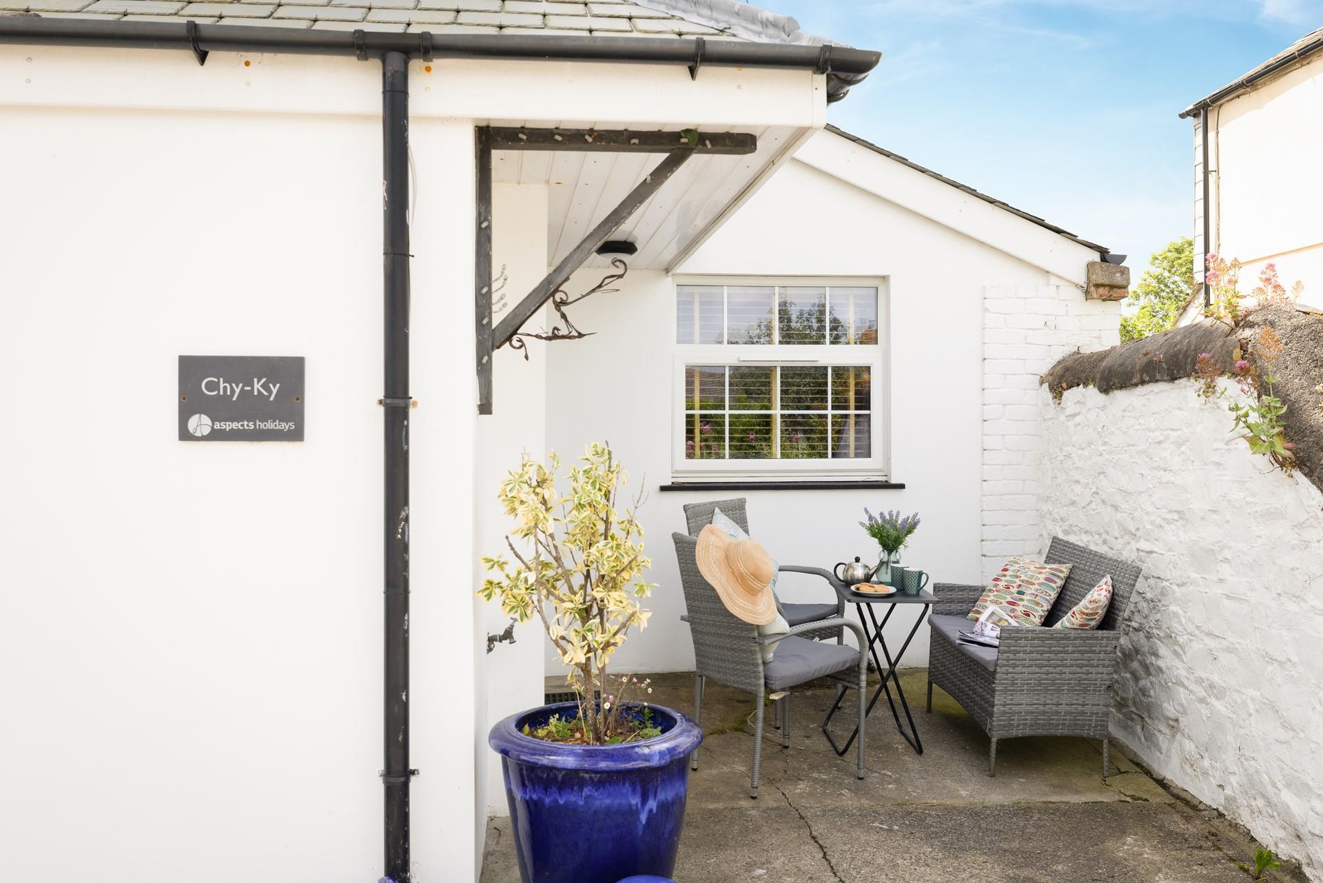 Soak up the sun in the pretty courtyard with a drink in hand.