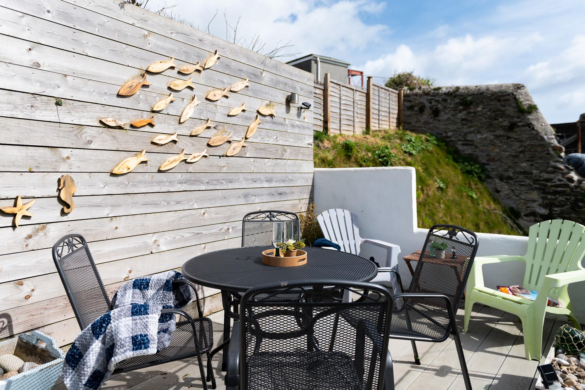 Why not spend a sunny afternoon hidden away on the decking area with a glass of something chilled and a good book?