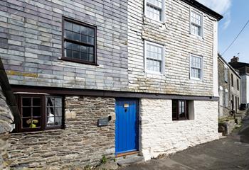 The bright blue door makes Smugglers Cottage easy to spot!