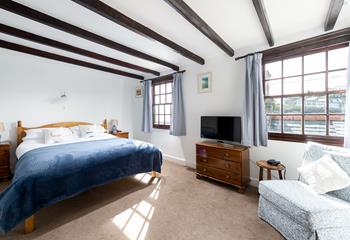 Bedroom 1 benefits from harbour views so you can enjoy your morning drink of choice whilst watching the comings and goings of the harbour.