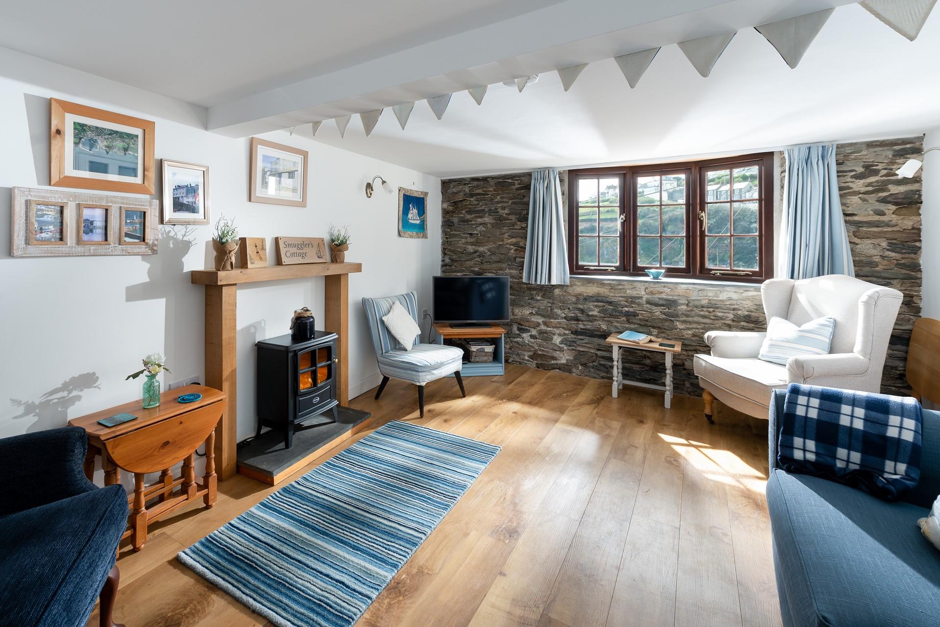 The lounge benefits from underfloor heating, making it the perfect place to cosy up for a night of films and board games!