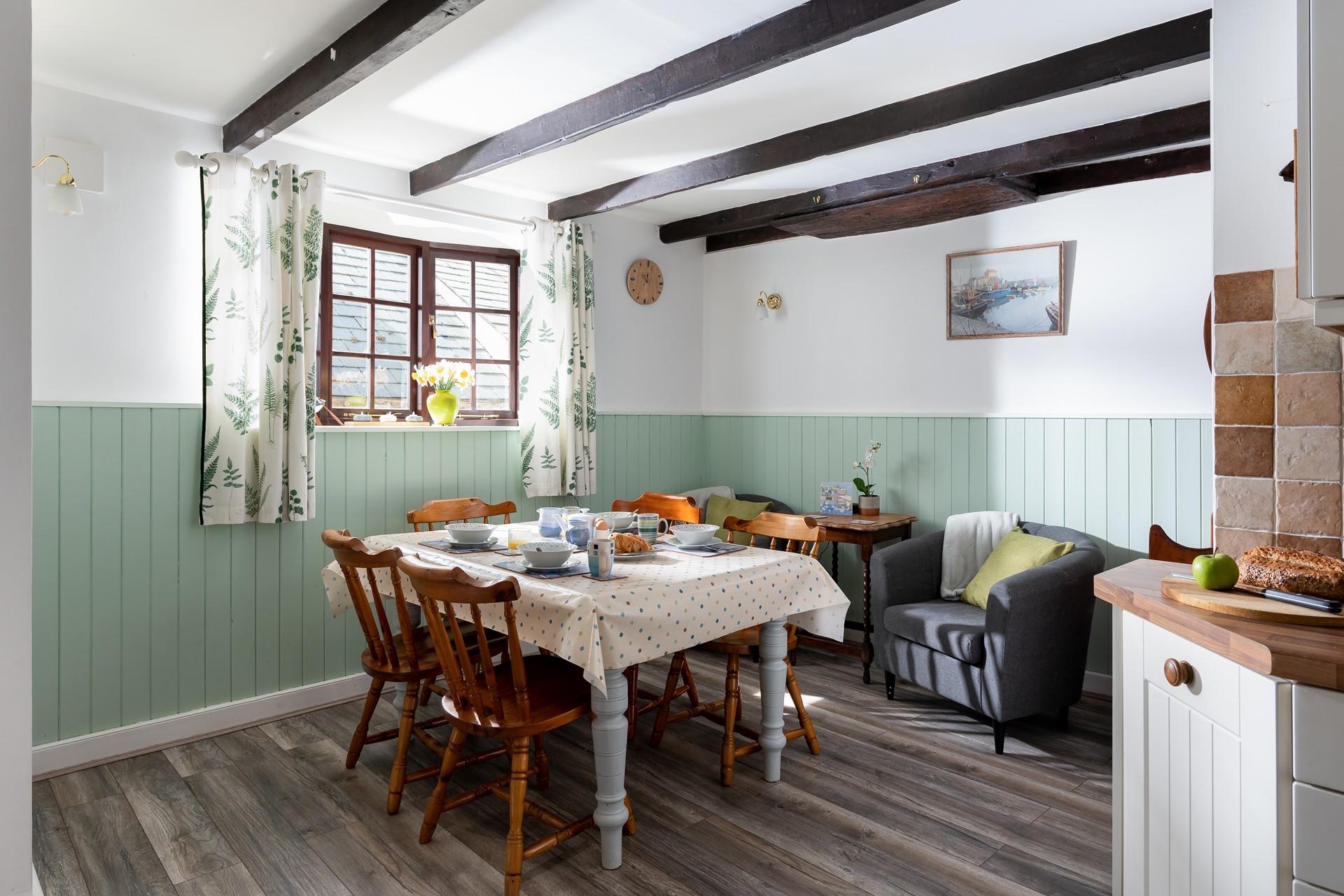 Blending modern with traditional seamlessly, the dining area is a fantastic space to socialise over a home cooked meal.