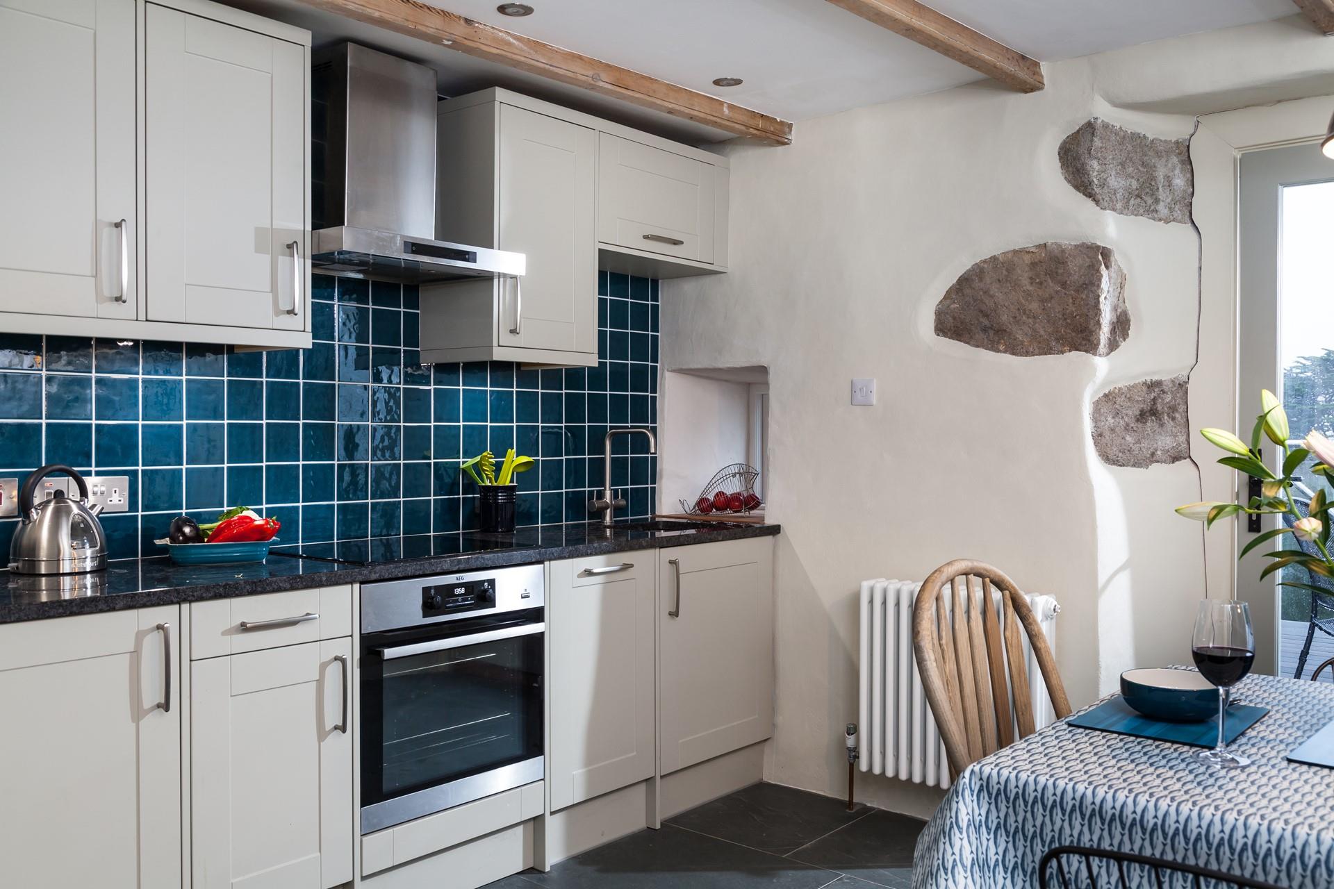 Beautifully finished, the elegant kitchen has a modern yet country vibe. 