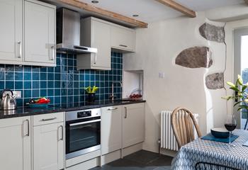 Beautifully finished, the elegant kitchen has a modern yet country vibe. 