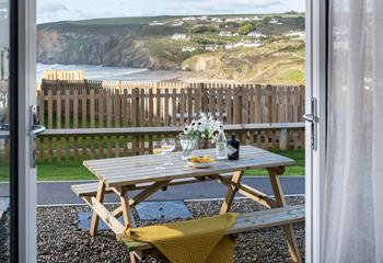 Enjoy the surrounding views from the picnic bench at the front of the house. 