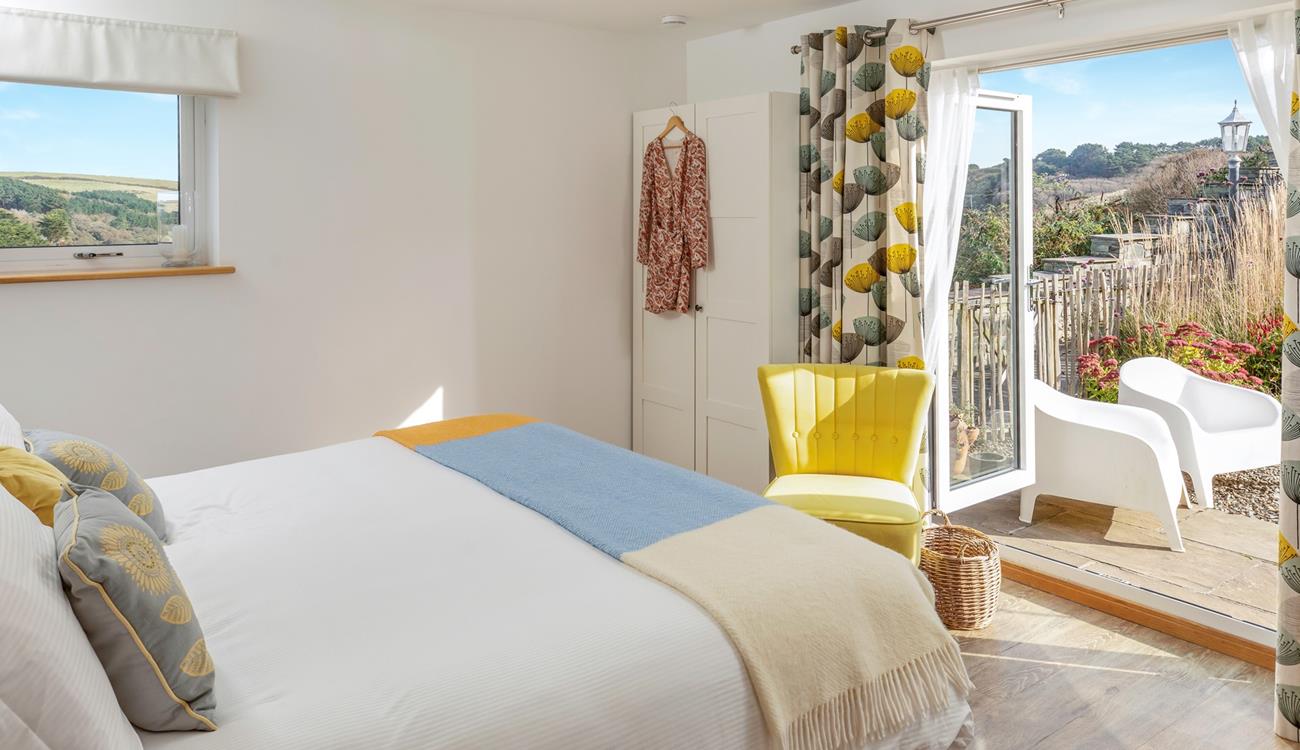 Wake up and open the patio doors to let the gentle sounds of the ocean in.