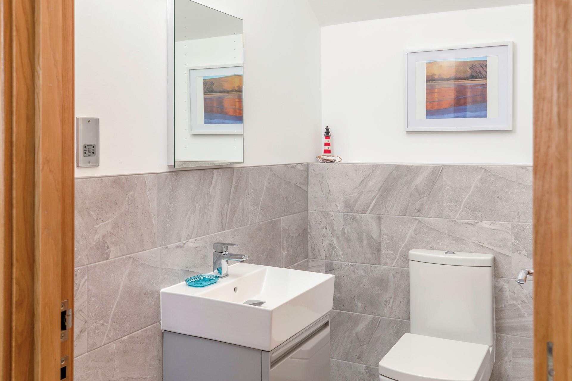 A cloakroom is a welcome addition on the first floor. 