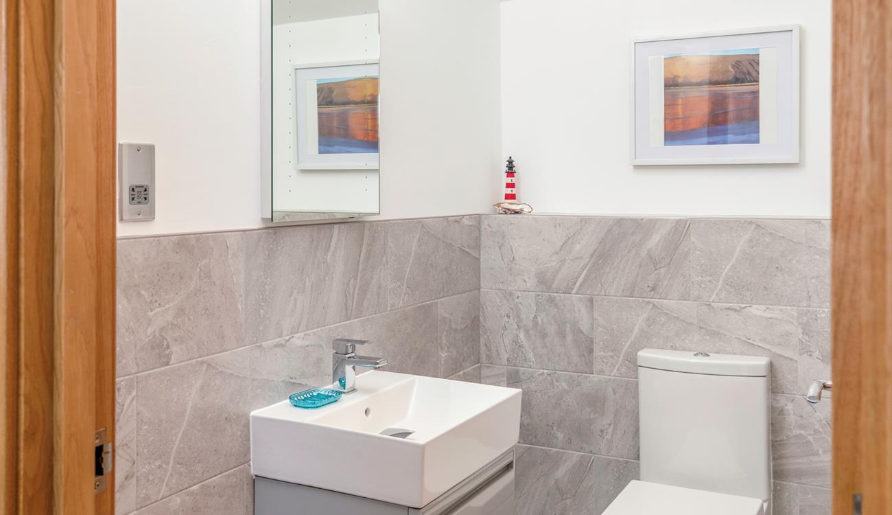 A cloakroom is a welcome addition on the first floor. 